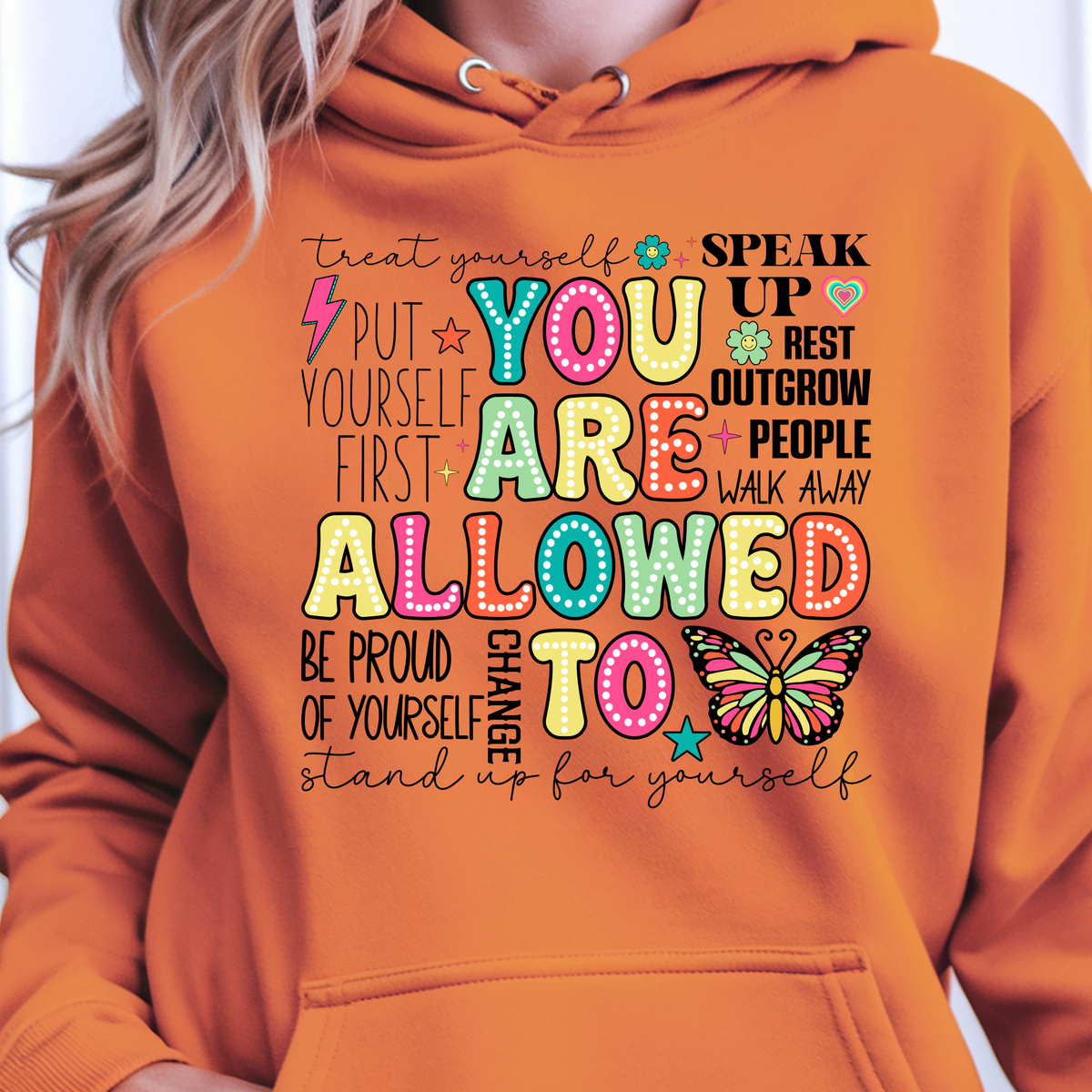 You Are Allowed To Hoodie inspirational affirmation hoodie featuring colorful lettering and cheerful icons.