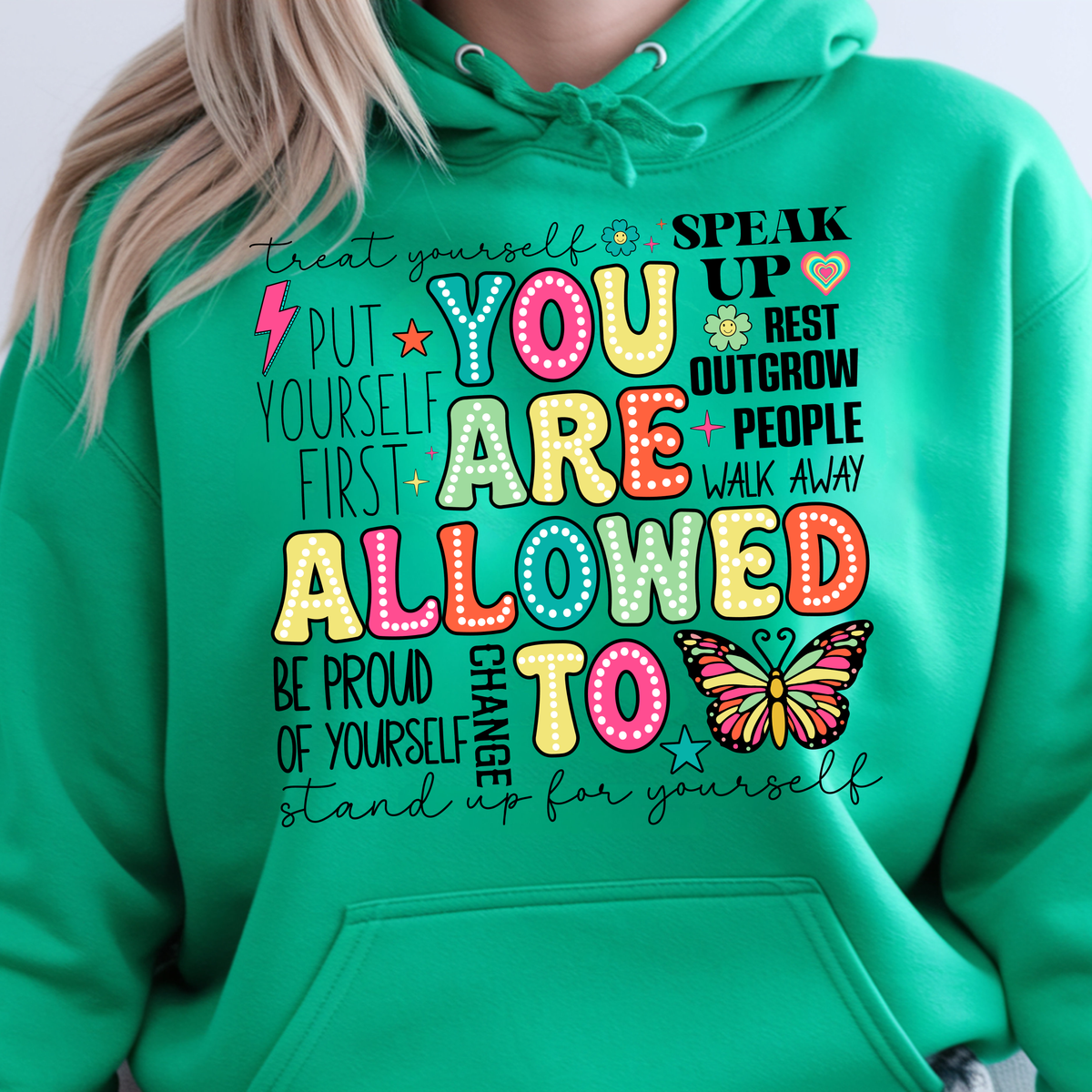 You Are Allowed To Hoodie inspirational affirmation hoodie with colorful lettering and positive icons on a bright green background.