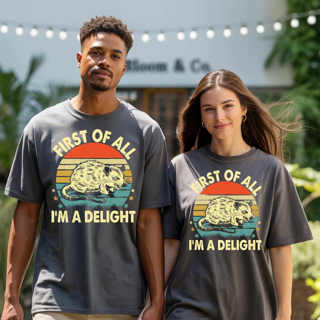 Vintage graphic t-shirt featuring the phrase "FIRST OF ALL I’M A DELIGHT" worn by models outdoors.
